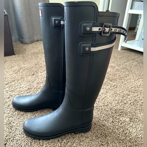 Hunter tall, slim fit rain boots. Size 8. Black. 100% rubber. Waterproof.